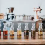 assorted glass with tea labeled on top of table inside the room