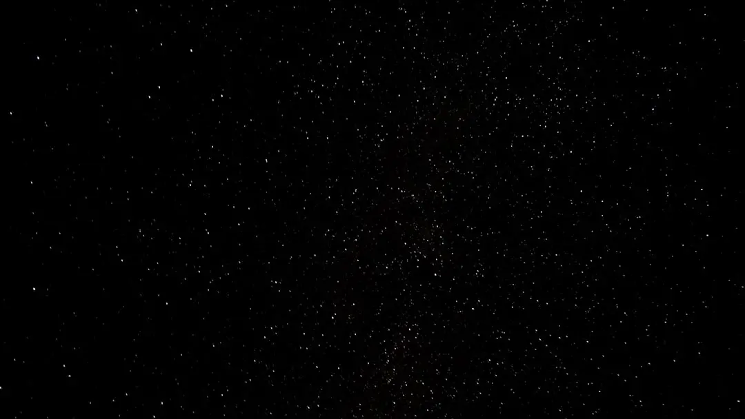 a black sky with a lot of stars