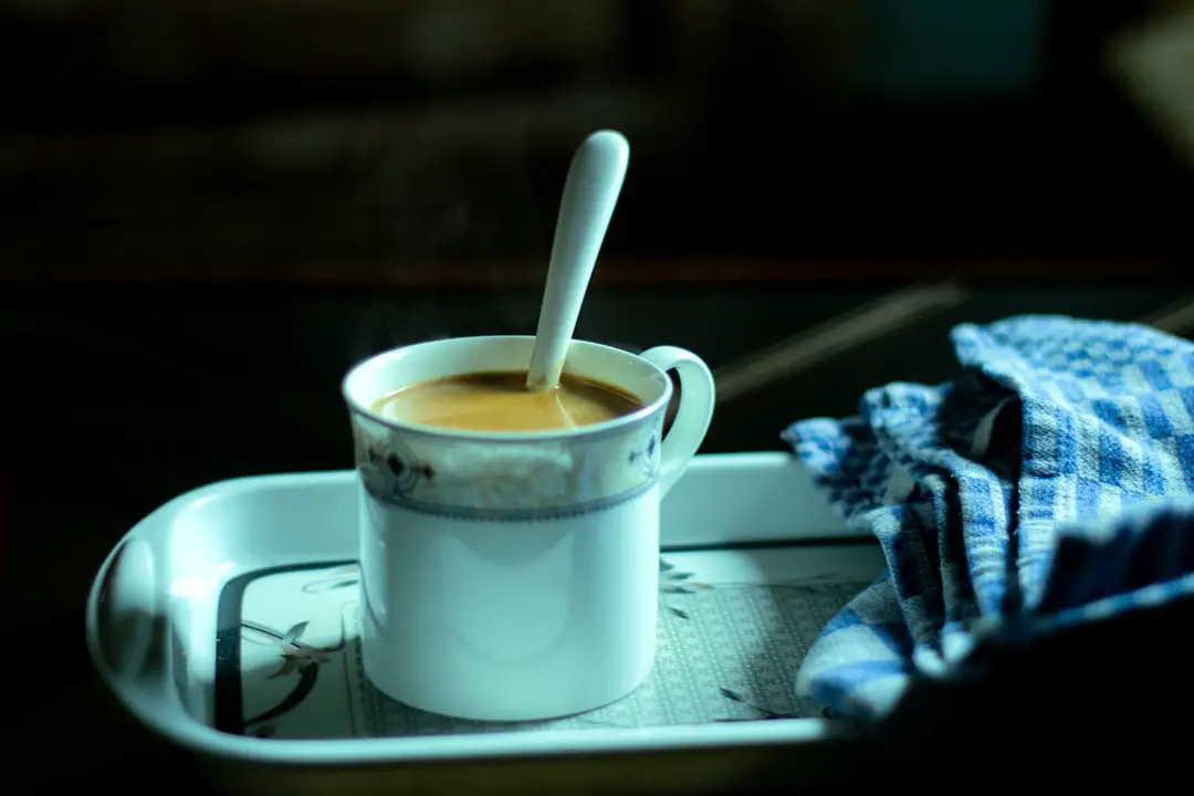 white ceramic mug with coffee